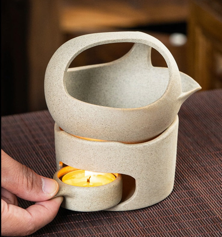 This is a ceramic scoop warmer set