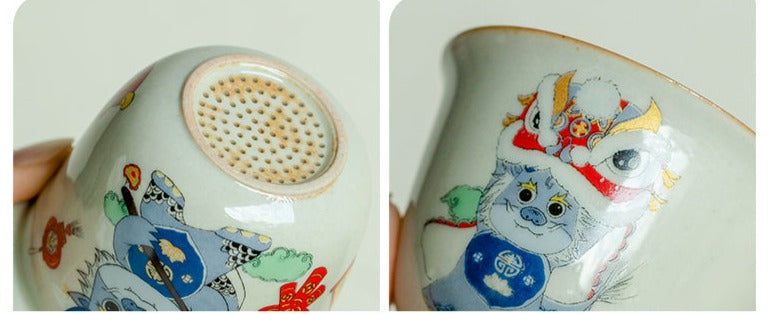 This is a ceramic teapot travel set