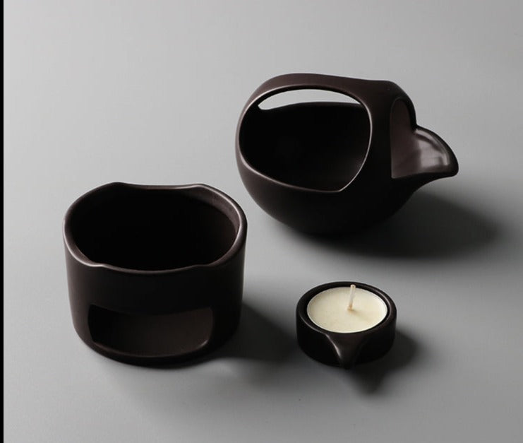 This is a ceramic scoop warmer set