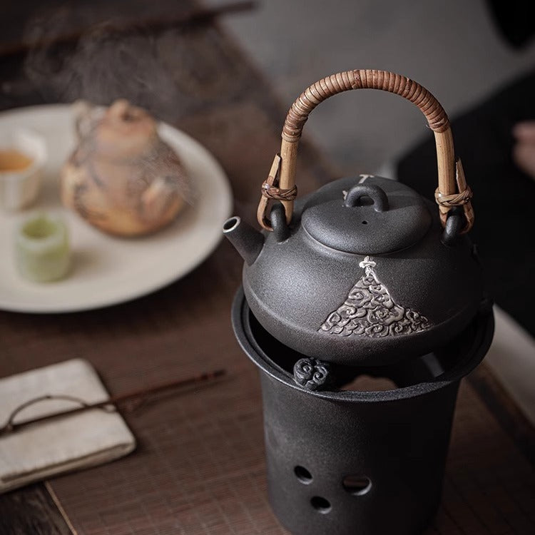 This is a pottery lifting handle kettle