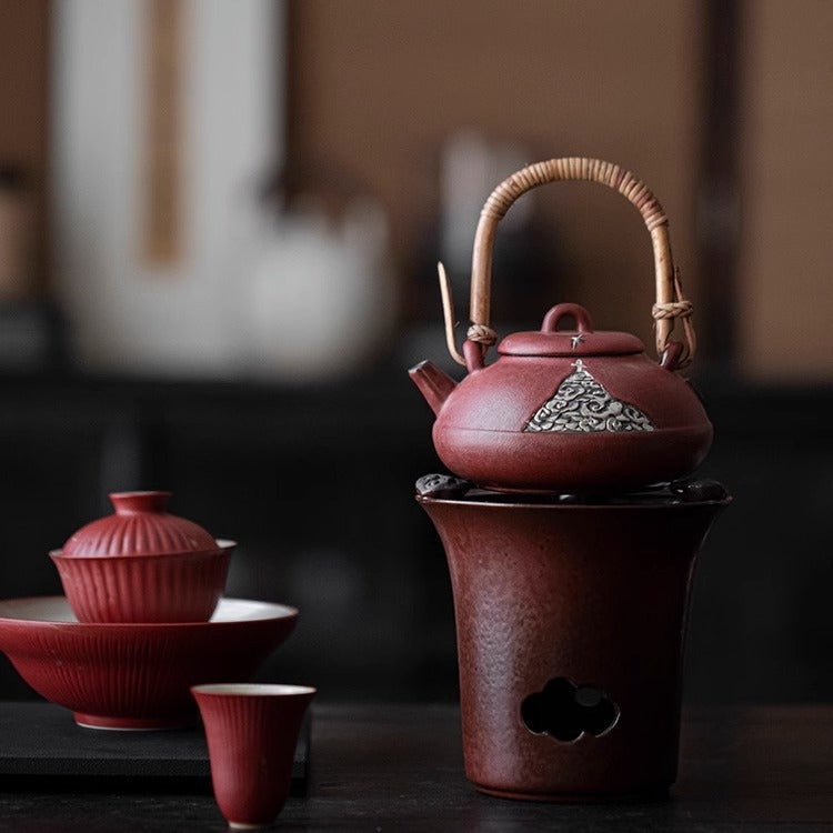 This is a pottery lifting handle kettle