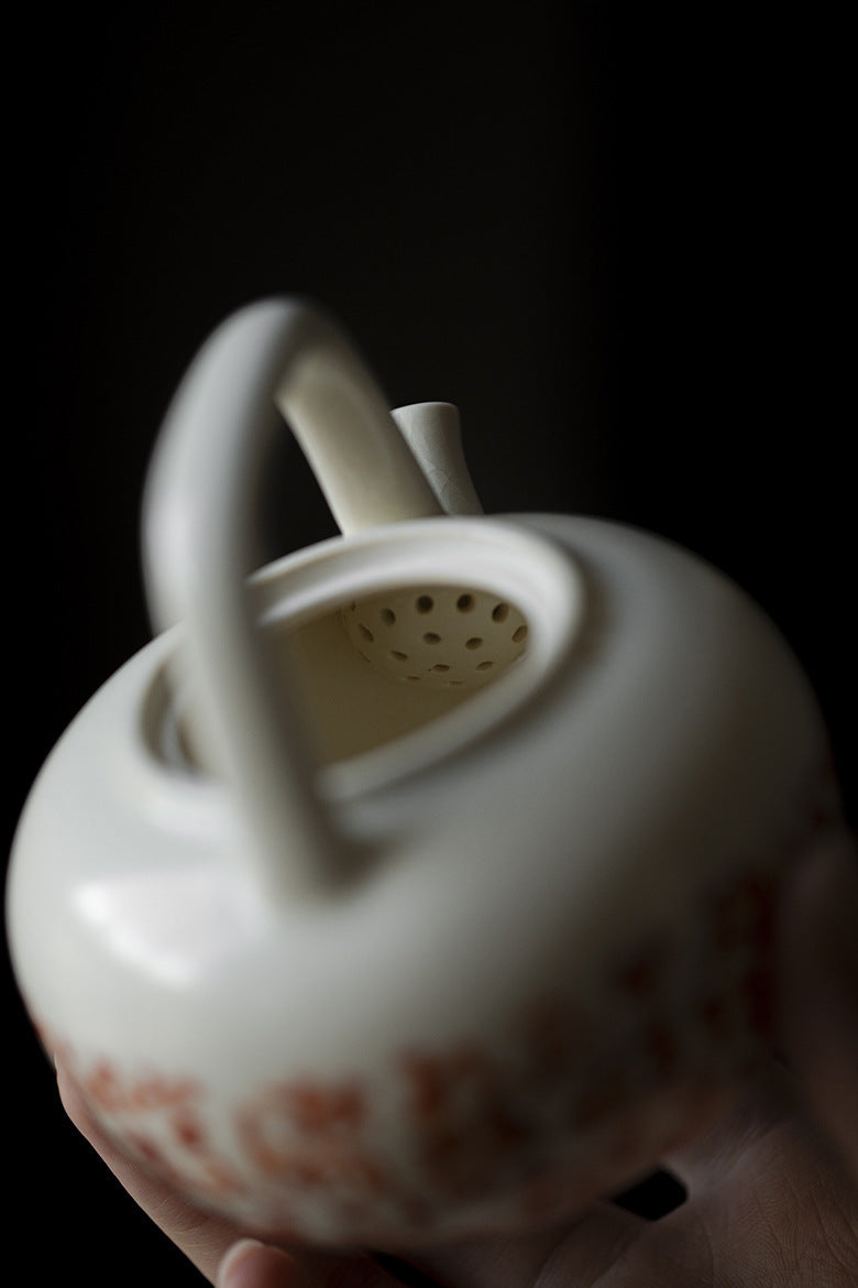 This is a soda glaze teapot