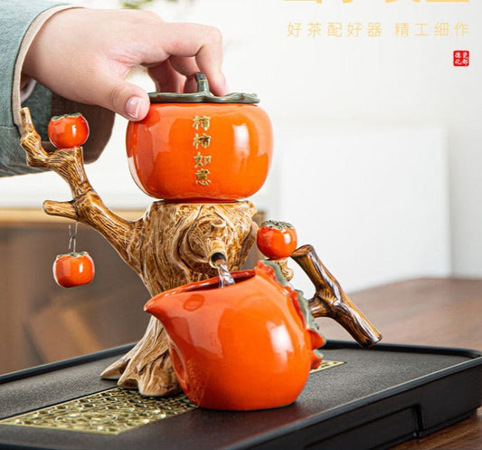 This is a persimmon-shaped automatic teapot