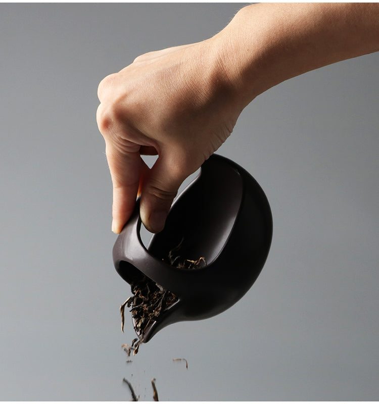 This is a ceramic scoop warmer set