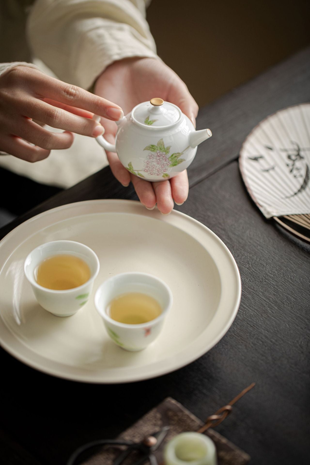 This is a ceramic teapot