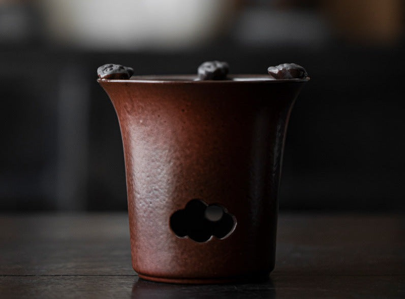 This is a pottery lifting handle kettle