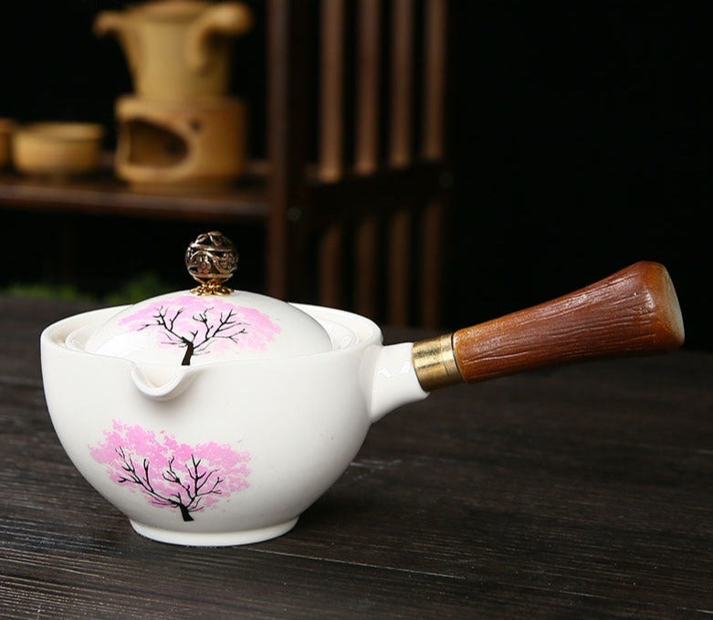 This is a side handle teapot set.this is a 360 rotating ceramic single teapot