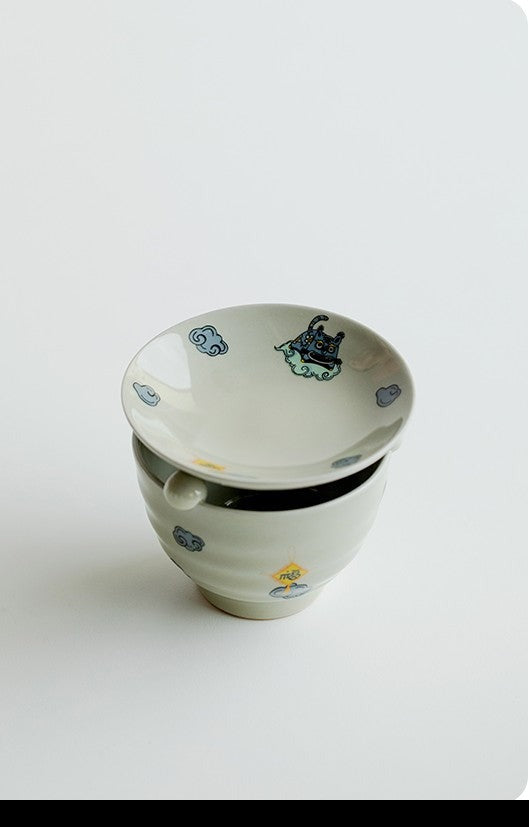 This is a ceramic scoop warmer set