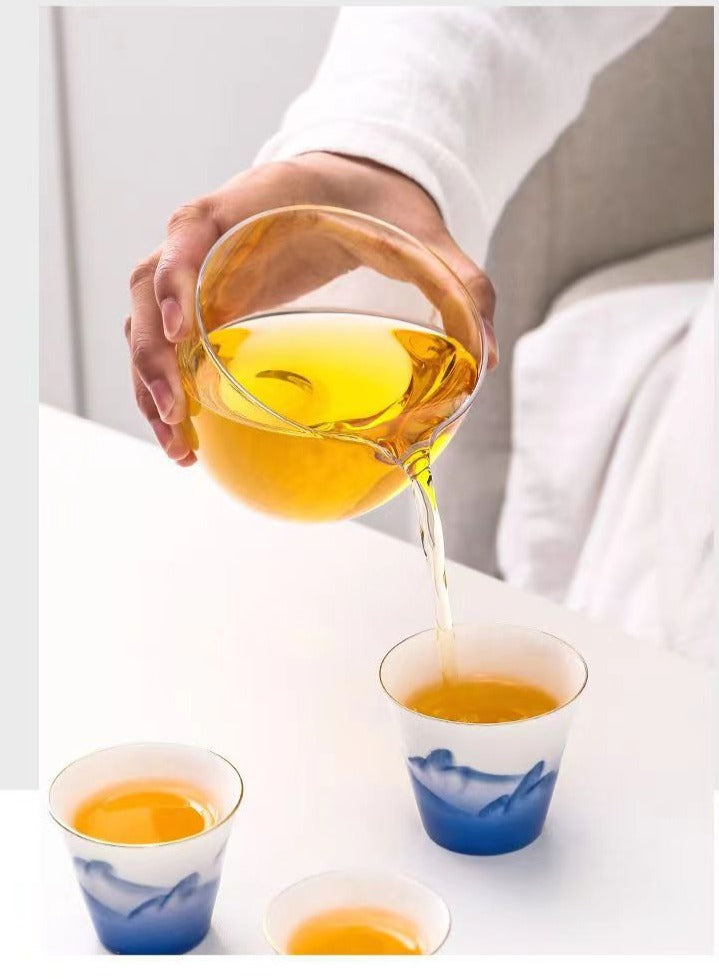This is a ceramic gaiwan teapot travel set