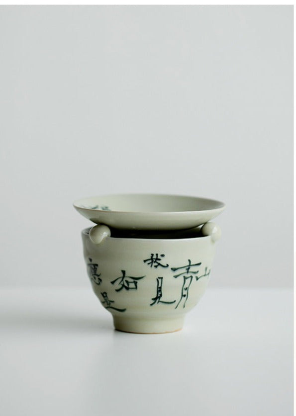 This is a ceramic scoop warmer set