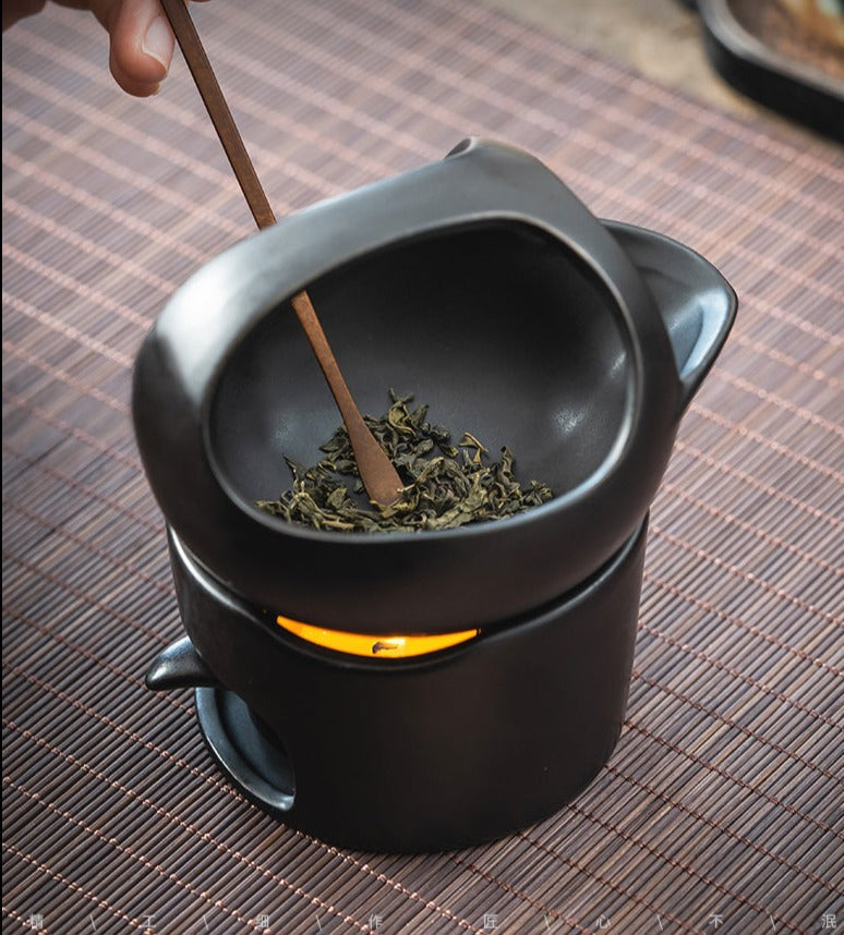 This is a ceramic scoop warmer set