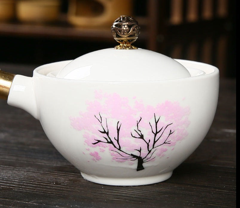 This is a side handle teapot set.this is a 360 rotating ceramic single teapot