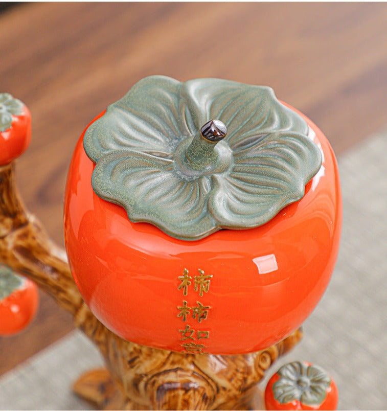 This is a persimmon-shaped automatic teapot