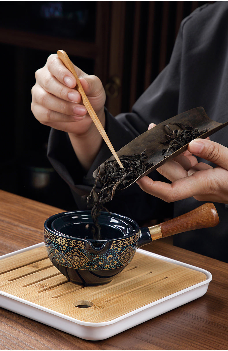 This is a side handle teapot set.this is a 360 rotating ceramic single teapot
