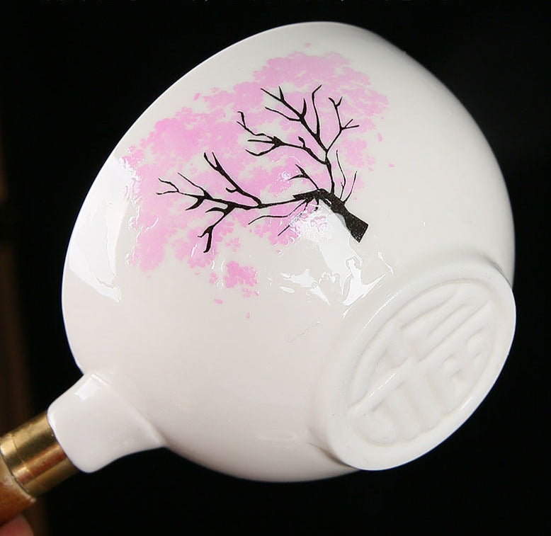 This is a side handle teapot set.this is a 360 rotating ceramic single teapot