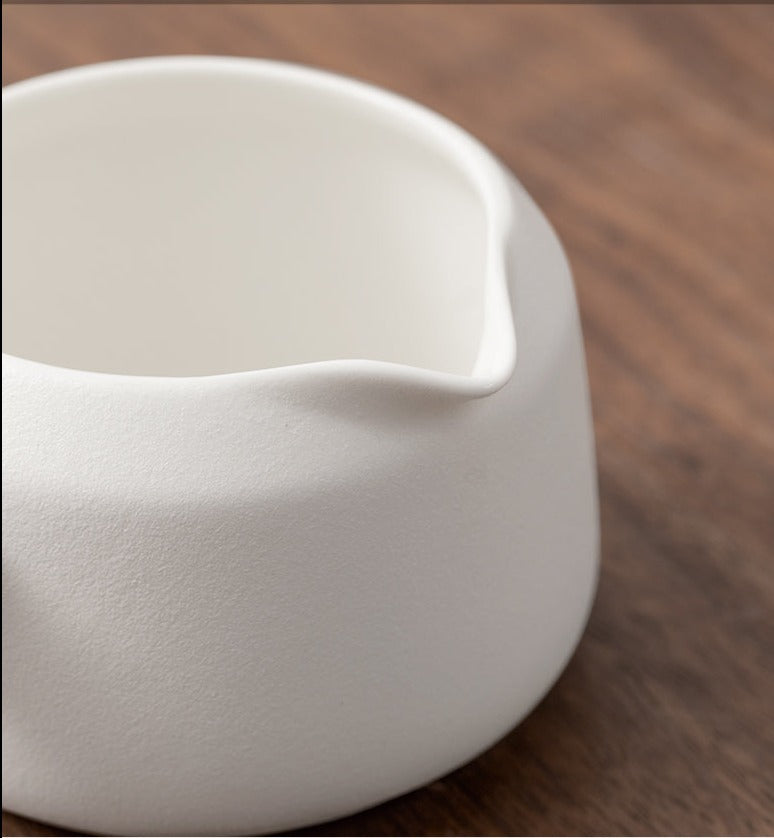 this is an automatic ceramic teapot