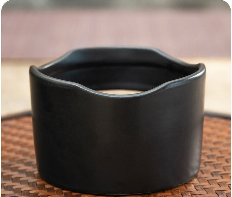 This is a ceramic scoop warmer set