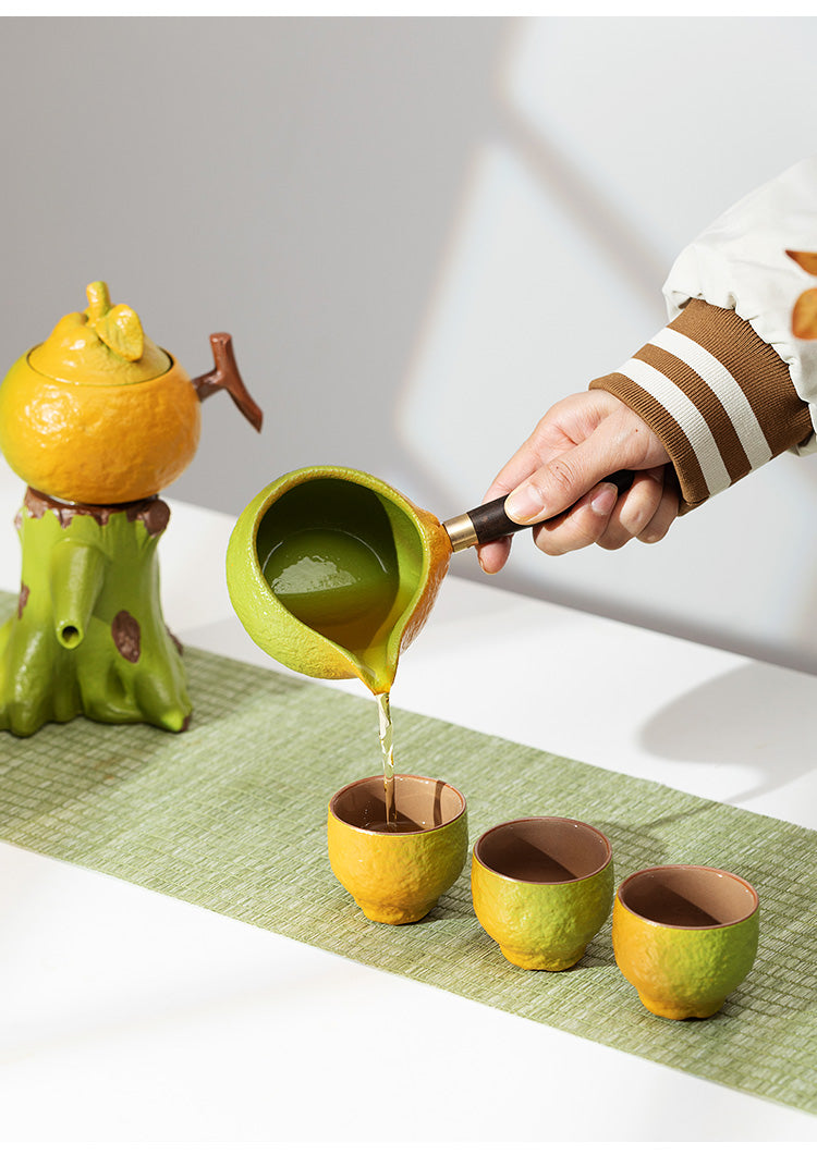 this is an automatic ceramic teapot.this is orange shape teapot