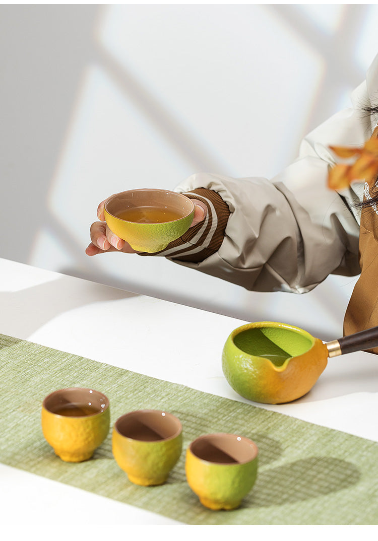 this is an automatic ceramic teapot.this is orange shape teapot