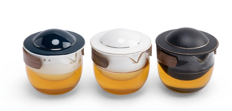 This is a glass teapot travel set