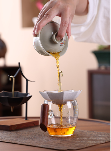 This is a ceramic umbrella shape tea filter tea strainer