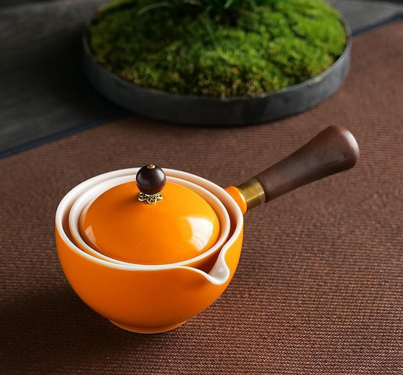This is a side handle teapot set.this is a 360 rotating ceramic single teapot