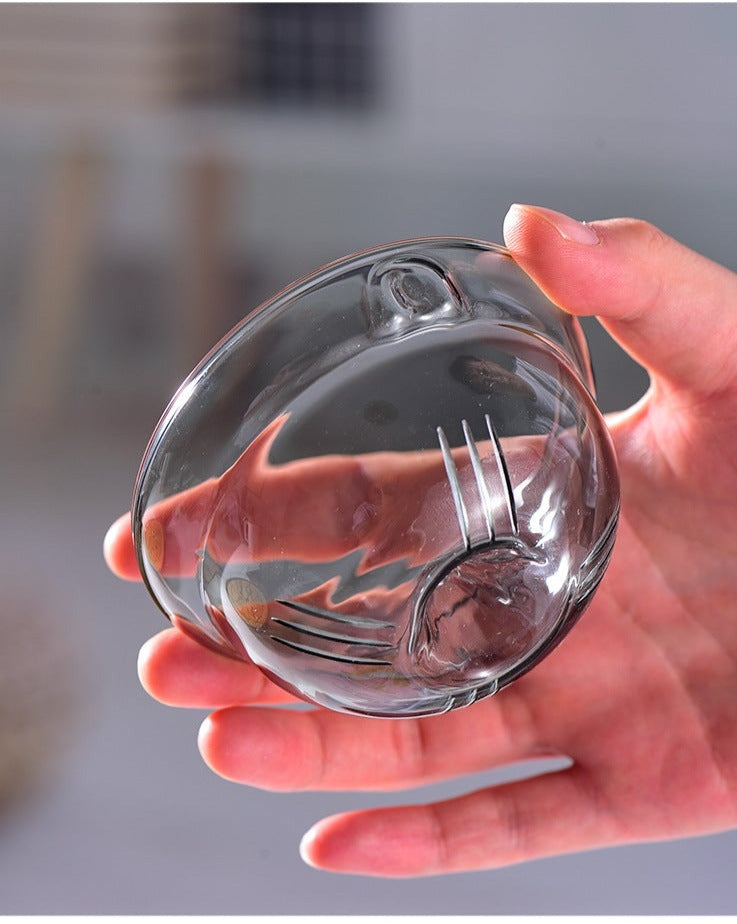 This is a side handle teapot set.this is a 360 rotating glass teapot