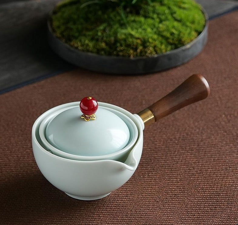 This is a side handle teapot set.this is a 360 rotating ceramic single teapot