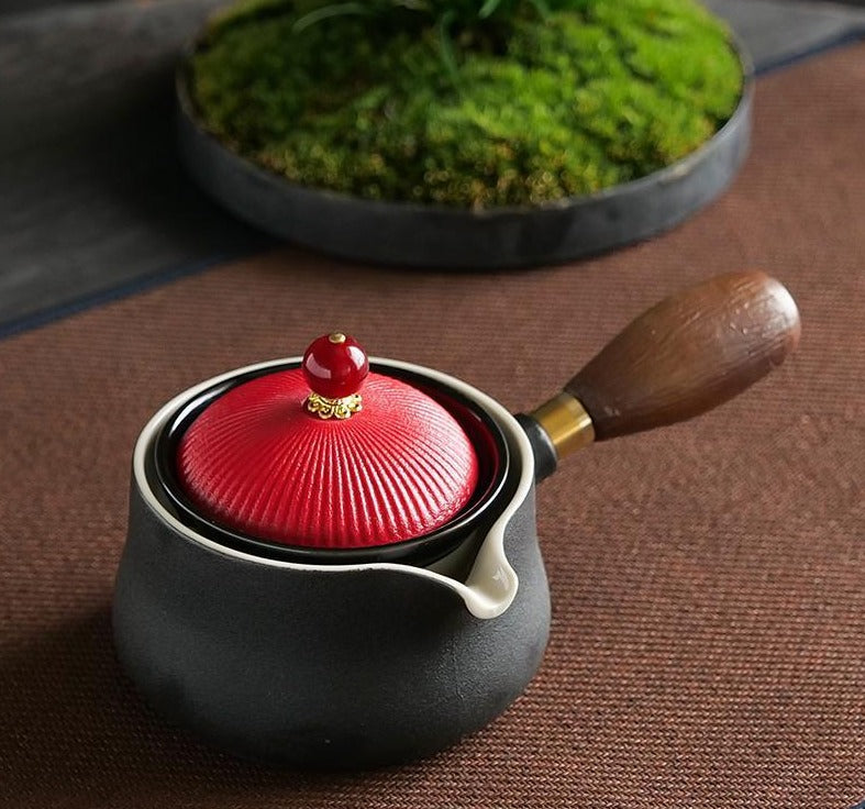 This is a side handle teapot set.this is a 360 rotating ceramic single teapot