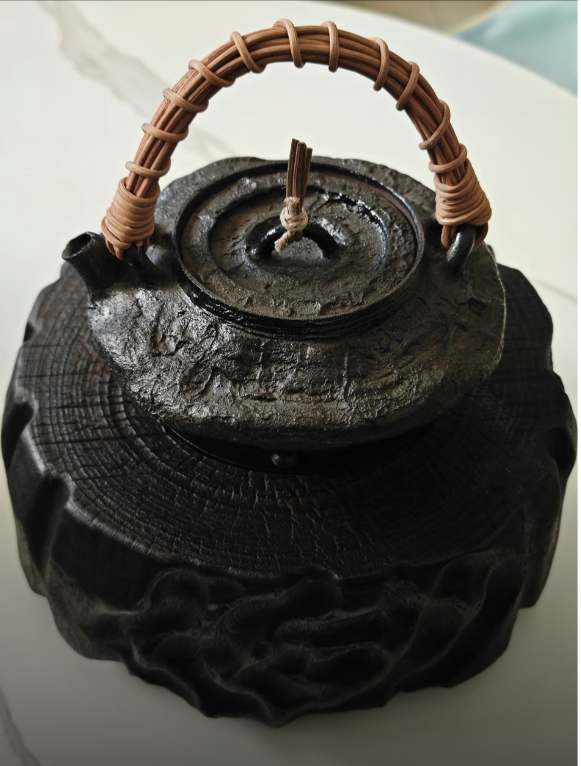 This is a pottery lifting handle kettle