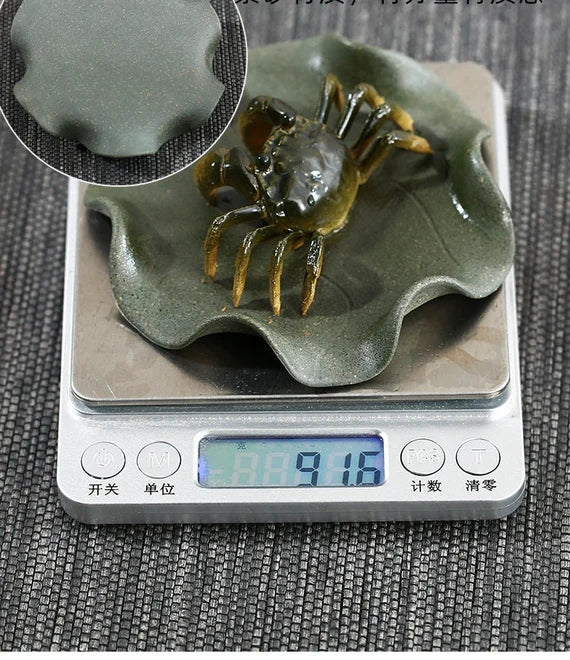 This is a Yixing clay color changing crab teapet