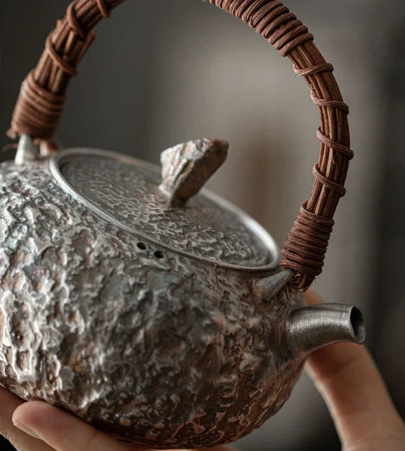 This is a gilted silver kettle