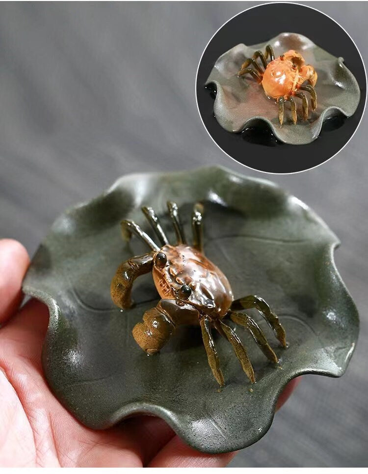 This is a Yixing clay color changing crab teapet
