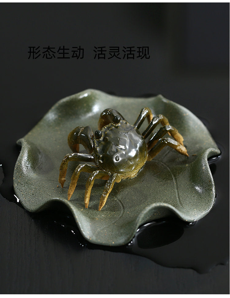 This is a Yixing clay color changing crab teapet