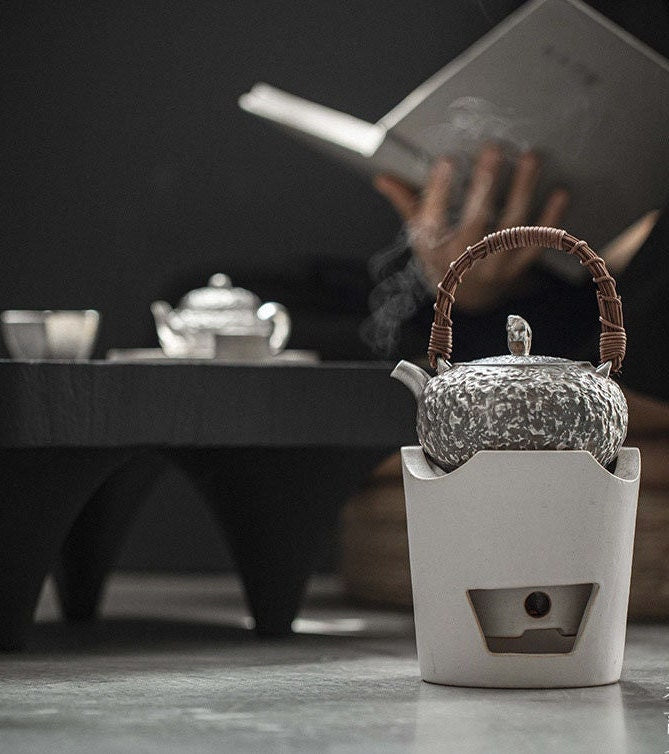 This is a gilted silver kettle