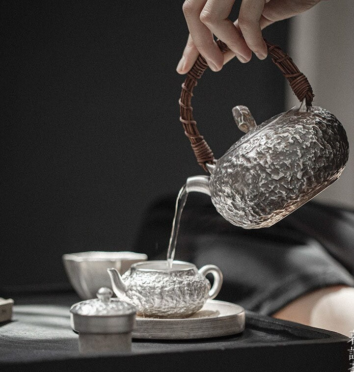 This is a gilted silver kettle