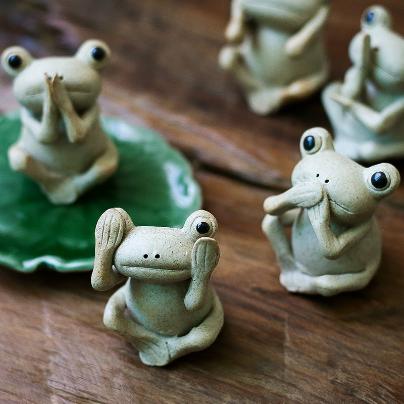 This is a pottery frog teapet