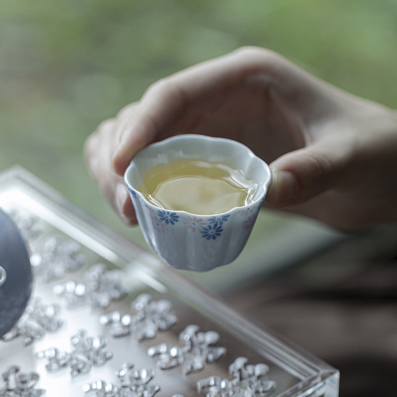 this is a ceramic teacup. this is a blue teacup