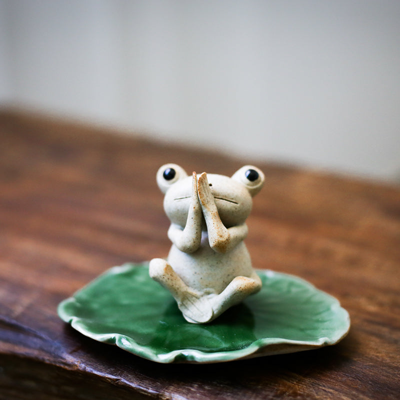 This is a pottery frog teapet