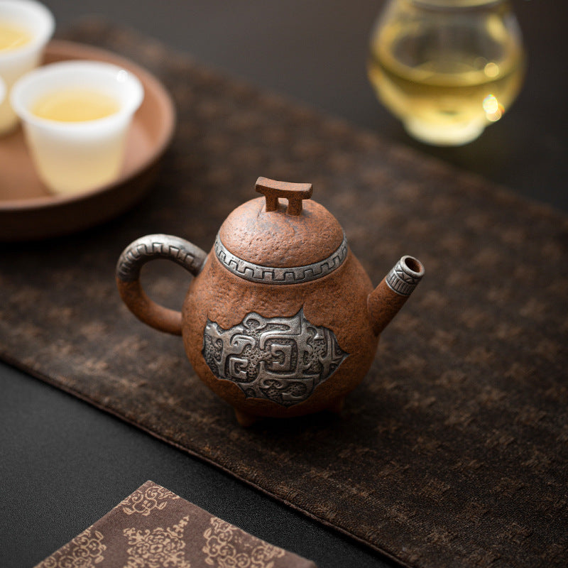 this is a pottery teapot. this is a pear teapot