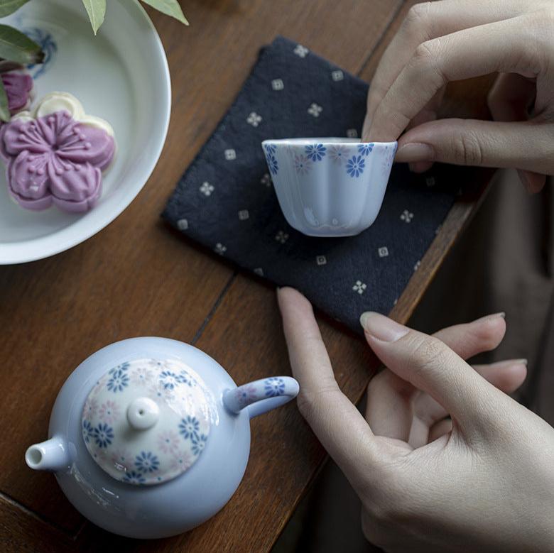 this is a ceramic teapot. this is a blue teapot