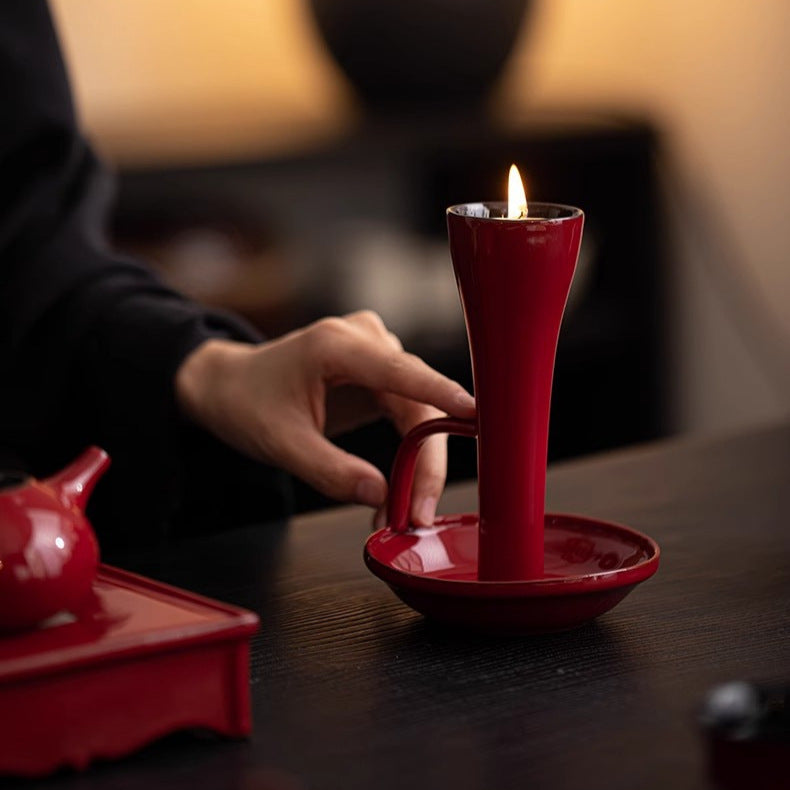 This is a ceramic candlestick candle holder