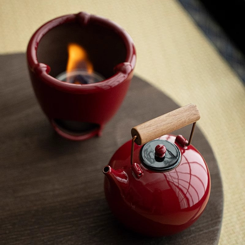 this is Chinese red kettle. this is a pottery kettle stove set