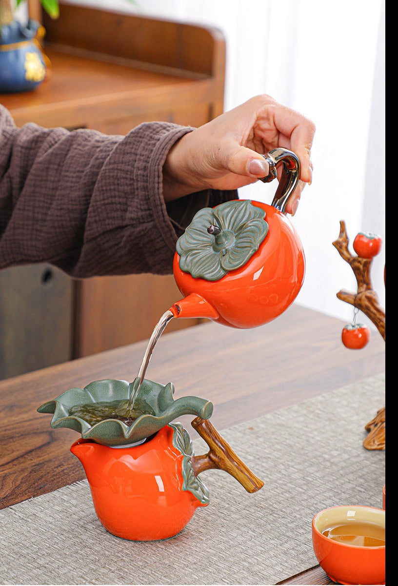 This is a persimmon-shaped automatic teapot