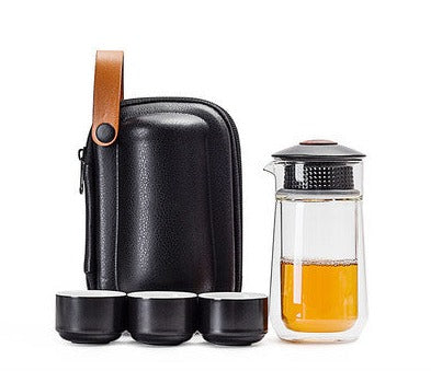 This is a glass teapot travel set