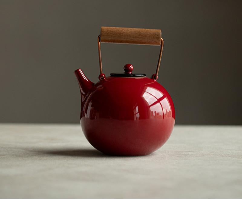 this is Chinese red kettle. this is a pottery kettle stove set