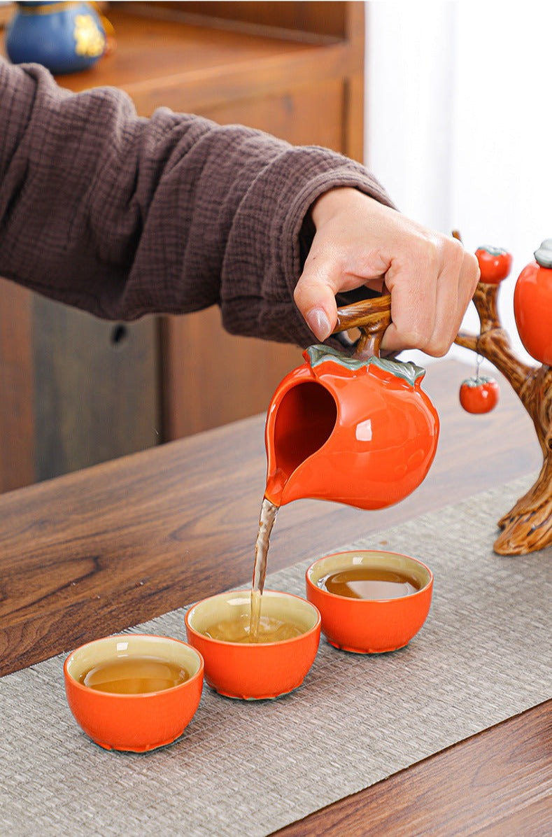 This is a persimmon-shaped automatic teapot