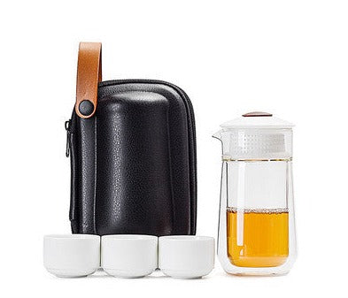 This is a glass teapot travel set