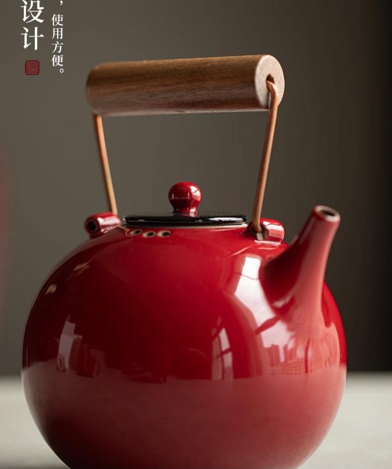 this is Chinese red kettle. this is a pottery kettle stove set