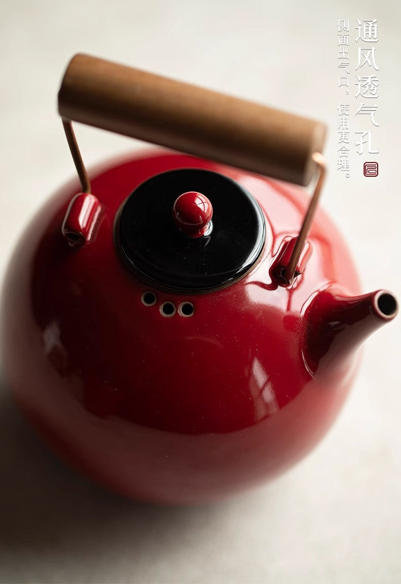 this is Chinese red kettle. this is a pottery kettle stove set